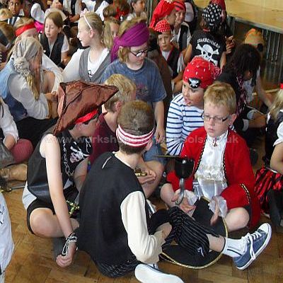Children working in pairs on pirate day