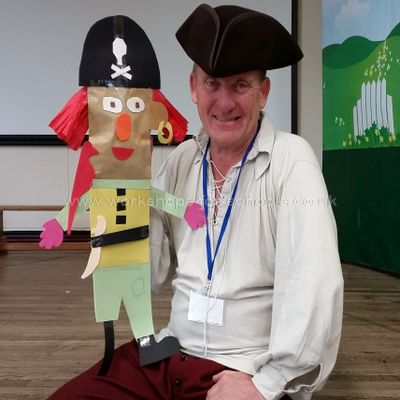 Pirate Ron holding a simple hand puppet